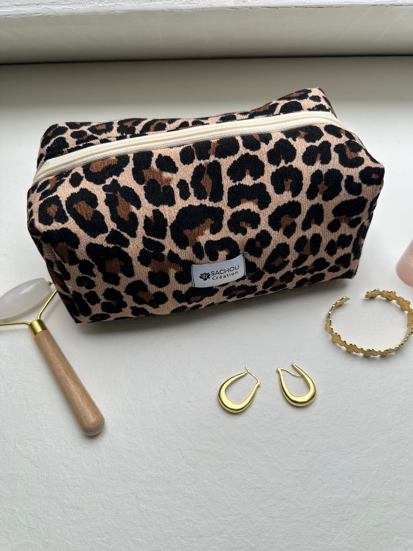 Trousse de toilette côtelée en velours imprimé léopard