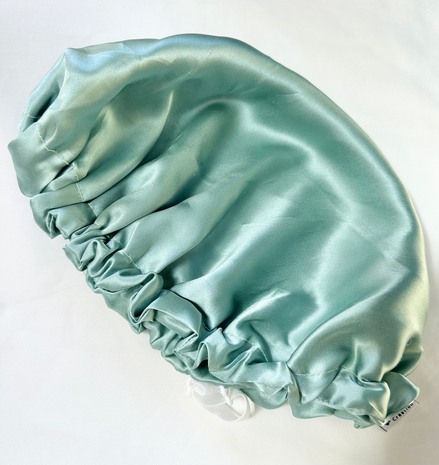 Bonnet ajustable enfant réversible en soie de mûrier (1 à 7 ans)