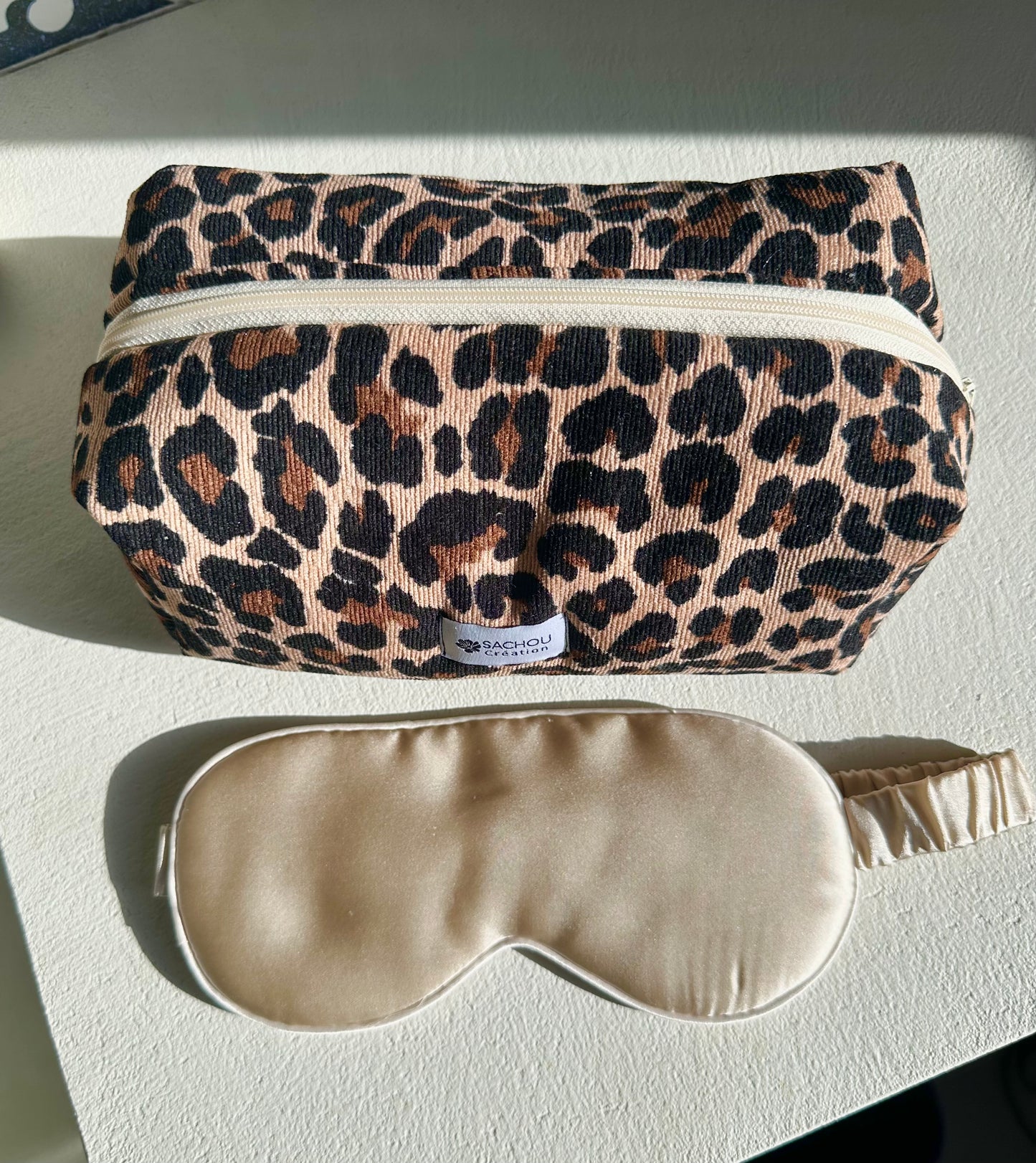 Trousse de toilette côtelée en velours imprimé léopard