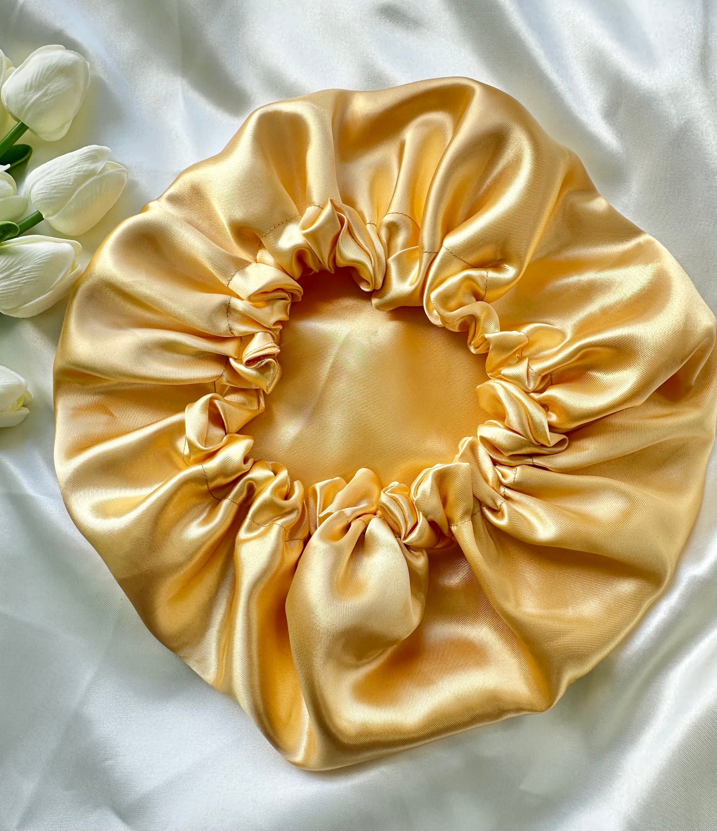 Bonnet en satin réversible
